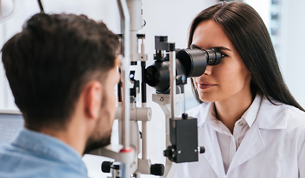 Doctor and patient in ophthalmology clinic
